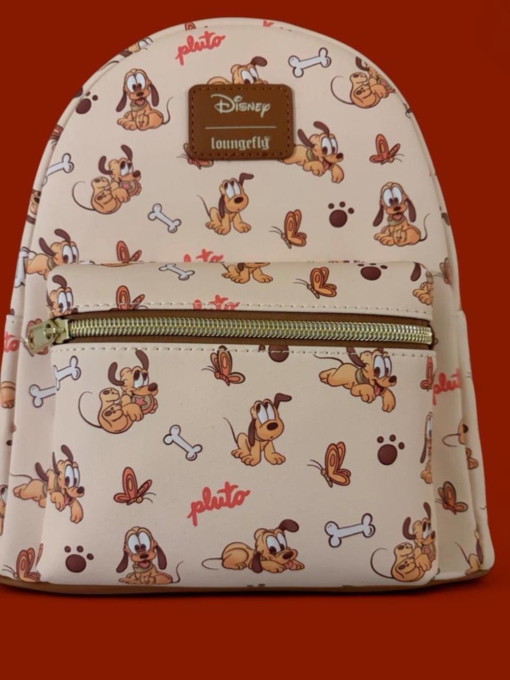 Loungefly Disney Pluto Cream Mini Backpack with Gold Zipper